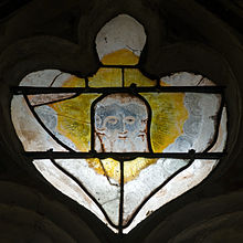 Stained glass window depicting the Trinity in three persons. Saint Martin church, Courgenard, France. Courgenard - St Martin SGW 01.jpg