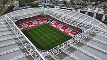 Competitive sport eventually resumed with games being played without spectators. Emirates Stadium aerial 2020-07.jpg