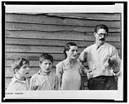Frank Tengle, an Alabama sharecropper, and family singing hymns