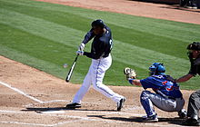 Griffey, batting against the Cubs after returning to the Mariners during Spring training, March 2009. KenGriffeyJr2009ST.JPG