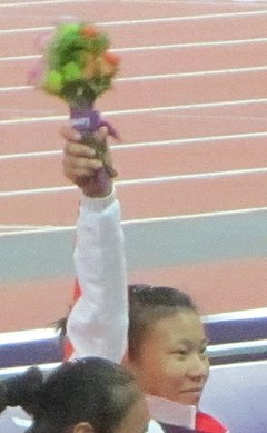 Liu Wenjun Gold Women's 100m T54 Victory Ceremony (cropped).jpg