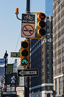 Dedicated bike signal (lower left) and left-turn signal (upper right) NYC 07 2012 Bike lane Broadway 4012.jpg