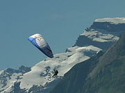 Paragliding in Swiss mountains. It is visible that the wing profile is as flat as mechanically possible to reduce the pitching moment.