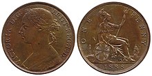 One sides of a bronze penny showing a woman with her hair in a bun