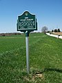 The sign marking the start/finish line on the original road course