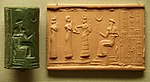 Cylinder seal of Hash-hamer, showing enthroned king Ur-Nammu, with modern impression (Sumerian); c. 2100 BC; greenstone; height: 5.3 cm; British Museum (London)[14]