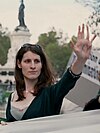 A transwoman with XY written on her hand, at a protest in Paris, October 1, 2005.