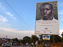 Campaign against domestic violence in Uganda True Manhood - Anti-Domestic Violence Sign - Outside Entebbe - Uganda.jpg