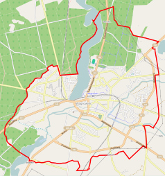 Mapa konturowa Wągrowca, blisko centrum po prawej na dole znajduje się punkt z opisem „Skrzyżowanie rzek Wełny z Nielbą”