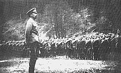 Главнокомандующий Лавр Корнилов перед фронтом войск. 1917
