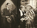 David Manners, Madge Evans e Ina Claire en la película de 1932 The Greeks Had a Word for Them, de Lowell Sherman.