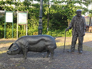 De Mortel, sculptuur De berenleider, door Toon Grassens