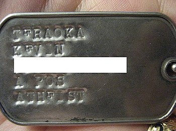 English: Military dog tags with religious (bel...