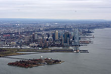 December 2014 aerial view of the area; in the foreground is Ellis Island, and behind it is Liberty State Park and Downtown Jersey City Ellis Island photo D Ramey Logan.jpg