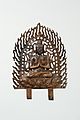 Bodhisattva aux mains jointes. Plaque bordée de flammes ajourées. Bronze doré, H. 24 cm, v. 680[27]