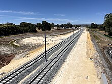 Double track railway viewed from a bridge