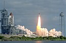 Shuttle mission STS-31 lifts off, carrying Hubble into orbit.