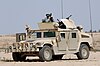 060322-N-5438H-018 Солдаты армии США, приписанные к 3-му батальону 320-го полка полевой артиллерии, вместе с солдатами иракской армии из 1-го батальона 1-й бригады 4-й дивизии, выполняют обычное патрулирование.