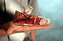 Bloody child's shoe after Palestinian attack on an Israeli shopping mall Bloody child's shoe after rocket fired from Gaza hit Israel.jpg