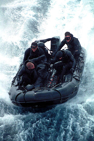 Members of the Sea Air Land Team Five (SEAL5),...