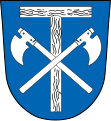 Gemeinde Wittibreut In Blau ein silbernes Philippuskreuz, überdeckt von zwei schräg gekreuzten silbernen Reuthauen.