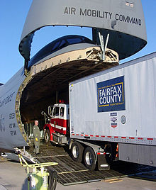 A tractor-trailer from Fairfax County, Virginia's Urban Search and Rescue Team loaded aboard a C-5 Galaxy heading for Bam, Iran DF-SD-06-04565.jpg