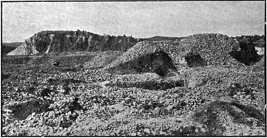 A barren stony and hilly landscape - the result from being sluiced for gold mining