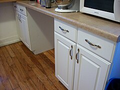 shelves are often combined with drawers in one cabinet frame