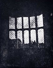 A latticed window in Lacock Abbey, England, photographed by William Fox Talbot in 1835. Shown here in positive form, this may be the oldest extant photographic negative made in a camera. Latticed window at lacock abbey 1835.jpg