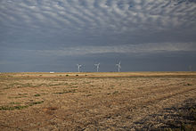 Wind turbines on the windswept high plains of the Llano Estacado, Lubbock County, Texas. Lubbock County Texas wind turbines 2011.jpg