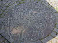 Bronzen plaquette in plaveisel van het Vrijthof (1973), Maastricht