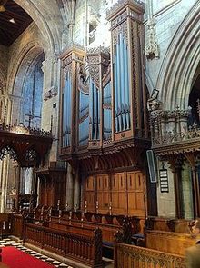 The organ at Selby Abbey, built in 1909 by William Hill & Son, (south) case designed by John Oldrid Scott Organ case by John Oldrid Scott in Selby Abbey.jpg