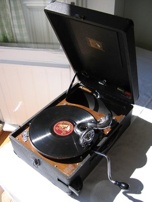 An early 1930s portable wind-up phonograph fro...