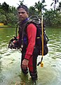 A man wearing SCUBA set