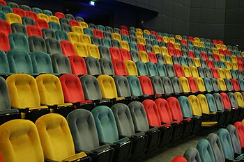 Empty IMAX theater with multicolored seats