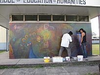 George Simon and Anil Roberts at work on Palace of the Peacock mural.jpg