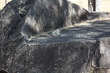 The grinding stone (used for grinding tobacco)