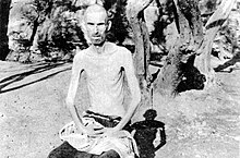 An emaciated male inmate suffering from severe malnutrition in the Italian Rab concentration camp on the island of Rab in what is now Croatia. Most of the people who were detained in this camp were Slavs (primarily Croats and Slovenes). Inmate at the Rab concentration camp.jpg