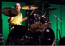 Freese performing live with Devo, in 2008