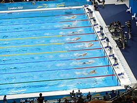 In his 100m butterfly heat, Phelps (fourth from top) was 8th at the 50m split before winning his heat and qualifying for the semi-finals London 2012 100m butterfly heats.jpg