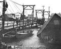 Snake River Bridge and post-storm destruction in Nome (October 1902) by Eric A. Hegg