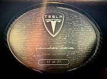 Signatures of early Tesla employees on the company's 17th car badge The Early Tesla Employees (50858218572).jpg