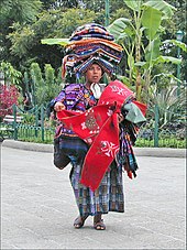 Indigenous Guatemalan selling souvenirs in Antigua. Vendeuse de souvenirs (Antigua, Guatemala) (6941638140).jpg
