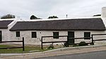 Type of site: House Current use: Residential. A particularly fine example of the folk architecture of South Africa.