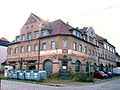 Konsumgenossenschaft; Wohnhaus der Konsumgenossenschaft in Ecklage mit Laden