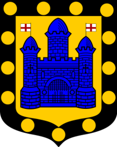 The town's coat of arms, a castle surrounded by 13 solid gold circles or heraldic bezants.