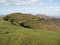 Photo of the British Camp hill showing its terraced Iron Age earthworks (from Malvern, Worcestershire)