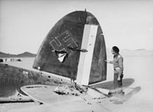 Tail of a downed bomber with Iraqi and Nazi German markings, Syria, December 1941. Heinkel He 111 in Syria 1941.jpg