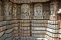 Horizontal frieze treatment in the Someshvara temple at Haranahalli with. Relief of Hindu deities in frieze on the third molding is absent.