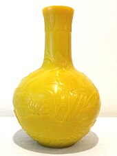 A Daoguang period Peking glass vase. Colored in "Imperial Yellow", due to its association with the Qing. Imperial Yellow Peking Glass Vase.jpg